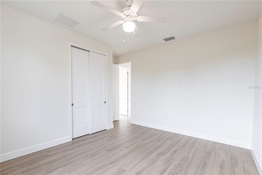 Spacious, unfurnished interior of a new home in , Port Charlotte (Image 39).