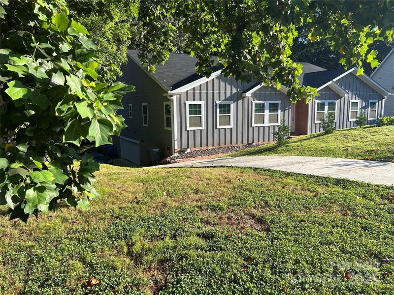 Exterior details and patio area of a home in , Belmont (Image 22).