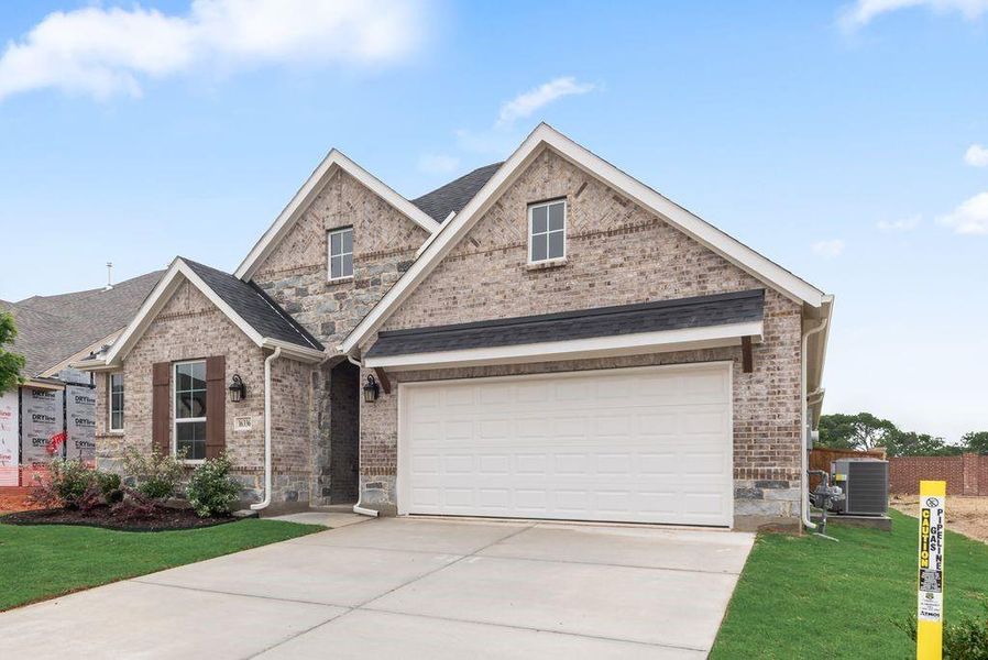 Front exterior of a new home in Wildflower Ranch, Fort Worth, TX, highlighting curb appeal (Image 19).