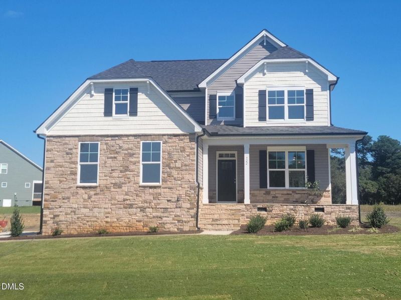 Front exterior of a new home in Tobacco Road, Angier, NC, highlighting curb appeal (Image 1). Front exterior of a new home in Tobacco Road, Angier, NC, highlighting curb appeal (Image 1).