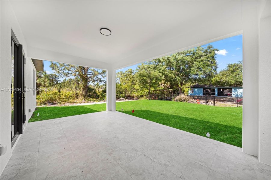 Exterior details and patio area of a home in , Lehigh Acres (Image 27).