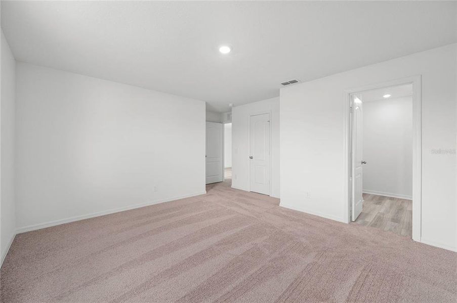 Spacious, unfurnished interior of a new home in Gum Lake Preserve, Lake Alfred (Image 16). Spacious, unfurnished interior of a new home in Gum Lake Preserve, Lake Alfred (Image 16).