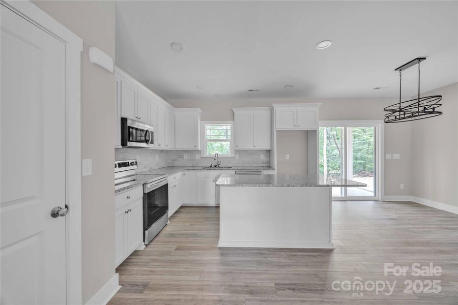 Furnished interior view inside a new home in , Mocksville (Image 7).