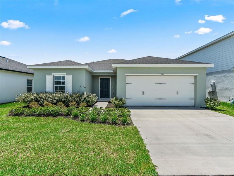 Front exterior of a new home in , Sumterville, FL, highlighting curb appeal (Image 23).