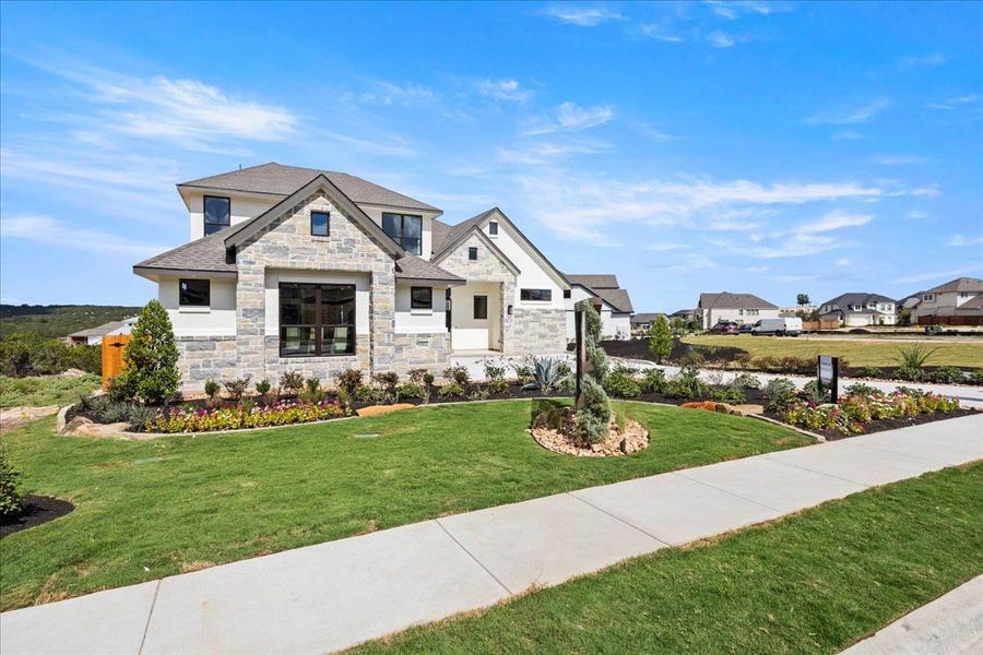 Front exterior of a new home in Sweetwater, Austin, TX, highlighting curb appeal (Image 21).