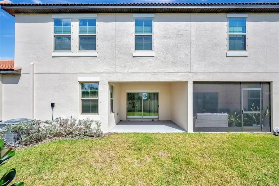 Exterior details and patio area of a home in , Wimauma (Image 32).