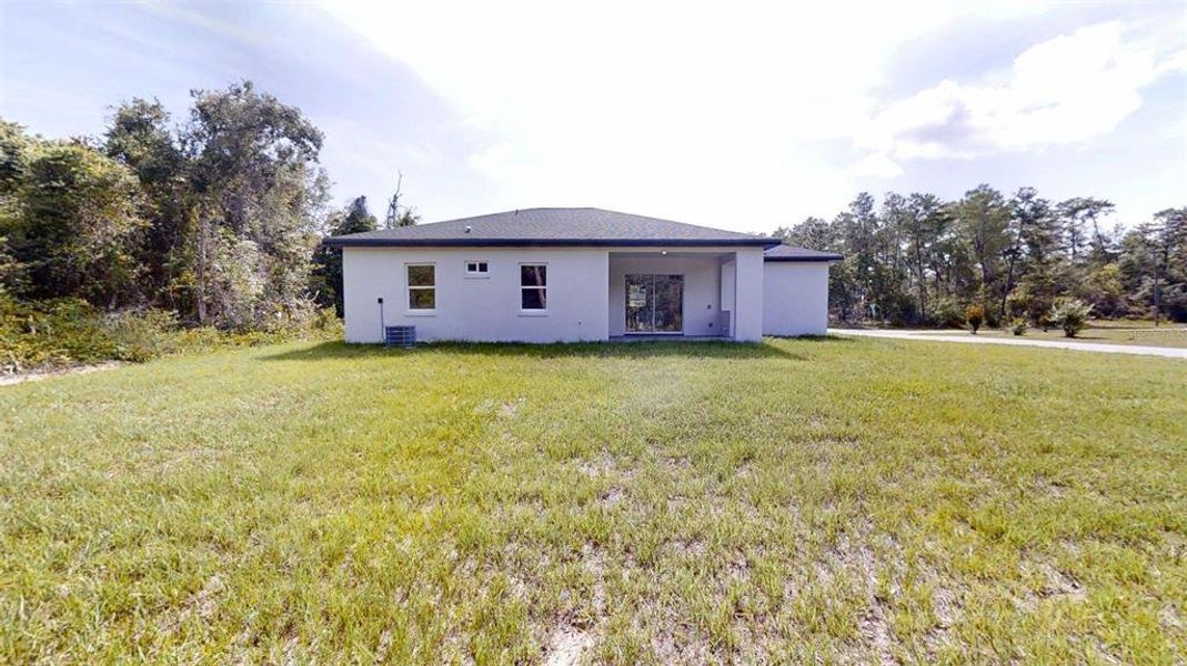 Front exterior of a new home in , Ocala, FL, highlighting curb appeal (Image 24).