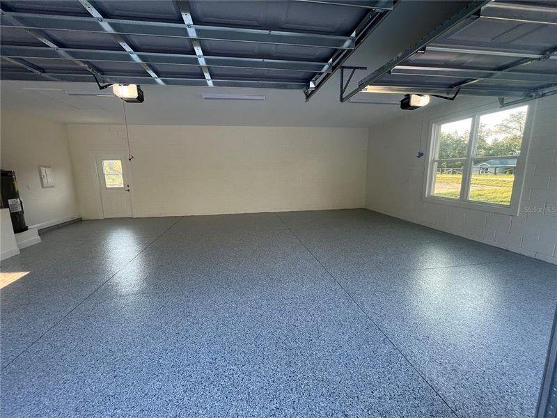 3-CAR GARAGE WITH EPOXY FLOORS -EPOXY IS A BUYER PAID UPGRADE