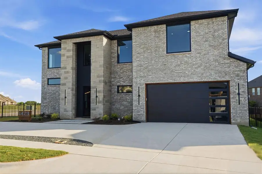 Front exterior of a new home in , Heath, TX, highlighting curb appeal (Image 2). Front exterior of a new home in , Heath, TX, highlighting curb appeal (Image 2).