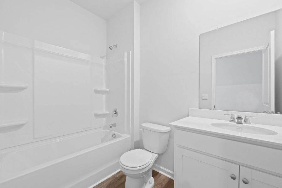 Furnished interior view inside a new home in Pine Hills at Cane Bay, Summerville (Image 10).