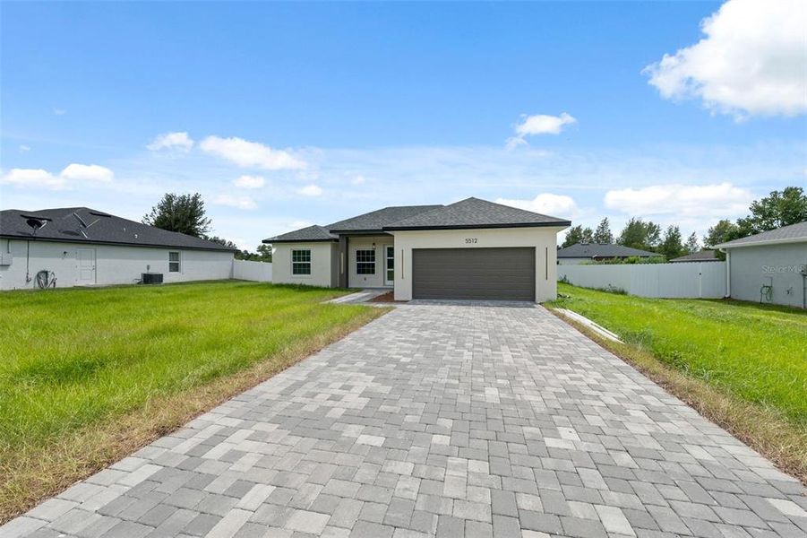 Front exterior of a new home in , Ocala, FL, highlighting curb appeal (Image 18). Front exterior of a new home in , Ocala, FL, highlighting curb appeal (Image 18).