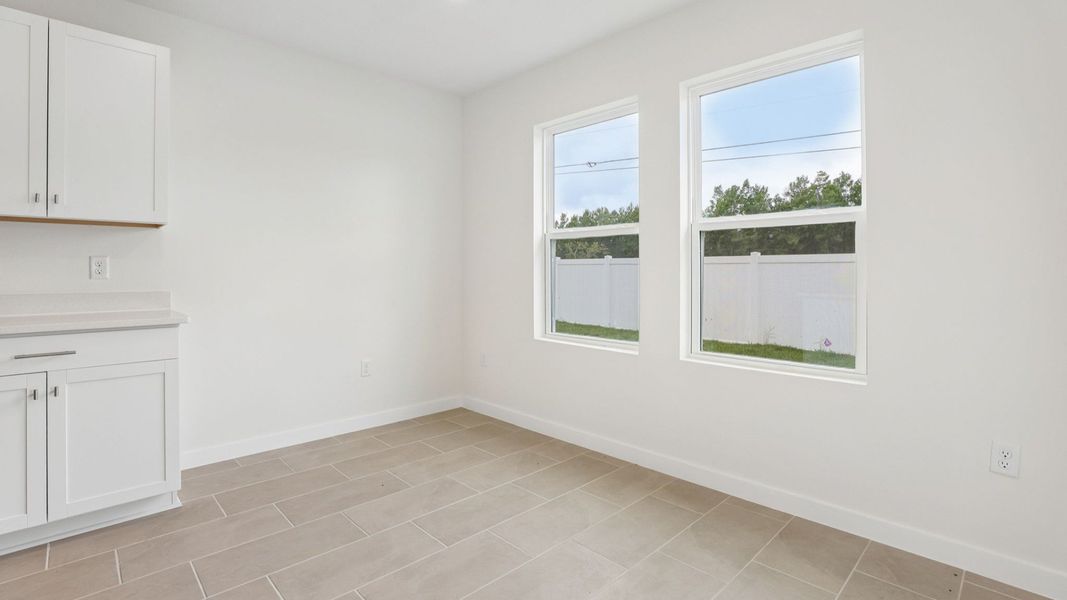 Furnished interior view inside a new home in Cyrene at Harmony, St. Cloud (Image 9).