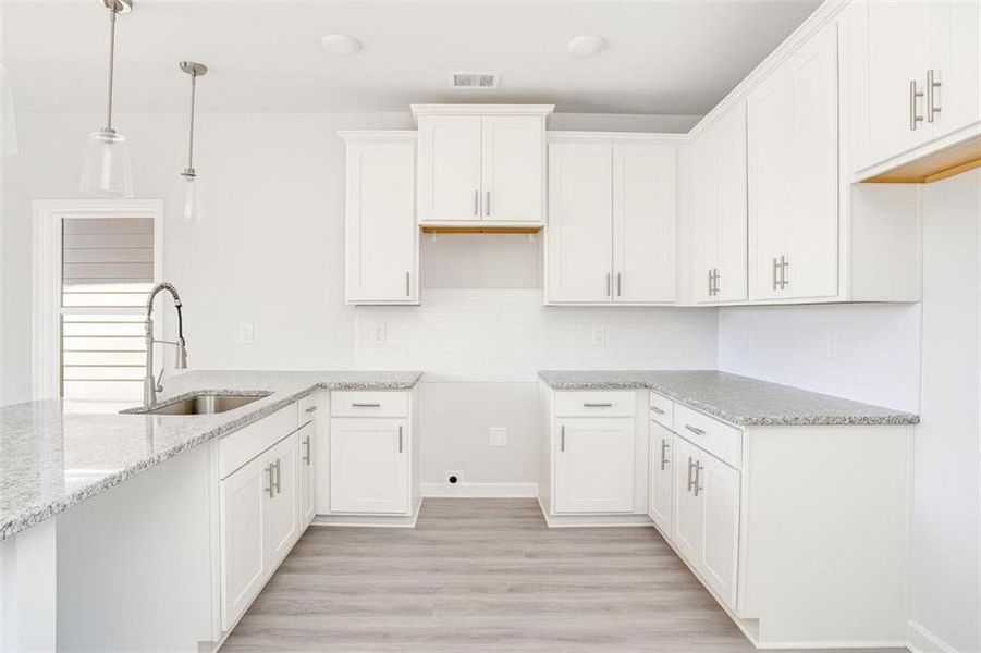 Furnished interior view inside a new home in The Cottages at East Lanier, Fairburn (Image 3).