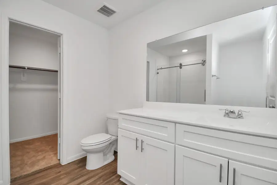 Furnished interior view inside a new home in Decker Farms, Magnolia (Image 4).