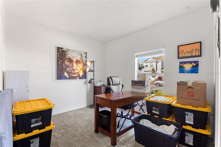 Furnished interior view inside a new home in Lawson Dunes: Estate Collection, Haines City (Image 18).