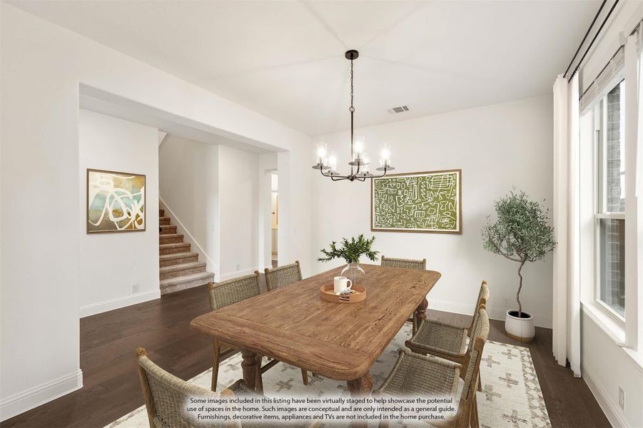 Dining room with wood table, six woven chairs, chandelier, and dark hardwood floors