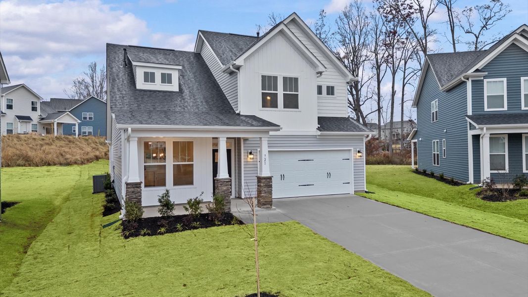 Front exterior of a new home in Fox Hollow, Spartanburg, SC, highlighting curb appeal (Image 20). Front exterior of a new home in Fox Hollow, Spartanburg, SC, highlighting curb appeal (Image 20).