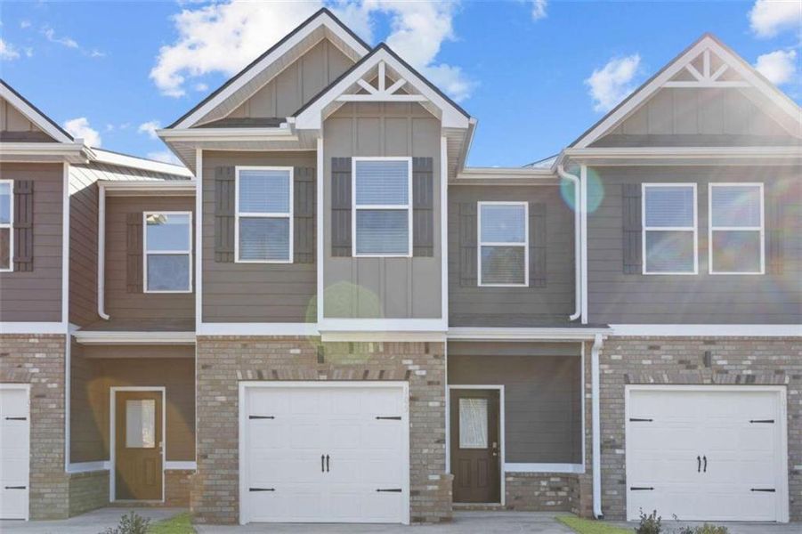 Front exterior of a new home in Azalea Hills, Temple, GA, highlighting curb appeal (Image 1). Front exterior of a new home in Azalea Hills, Temple, GA, highlighting curb appeal (Image 1).