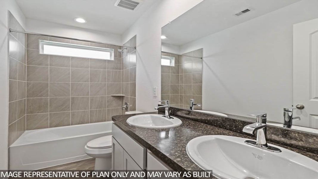 Furnished interior view inside a new home in Venetian Pines, Conroe (Image 4).