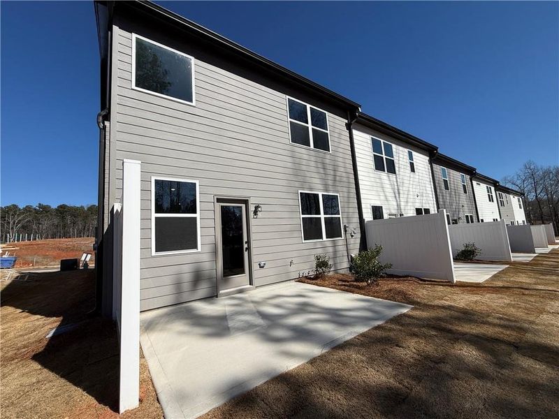 Exterior details and patio area of a home in The Towns at Auburn Station East, Auburn (Image 15).