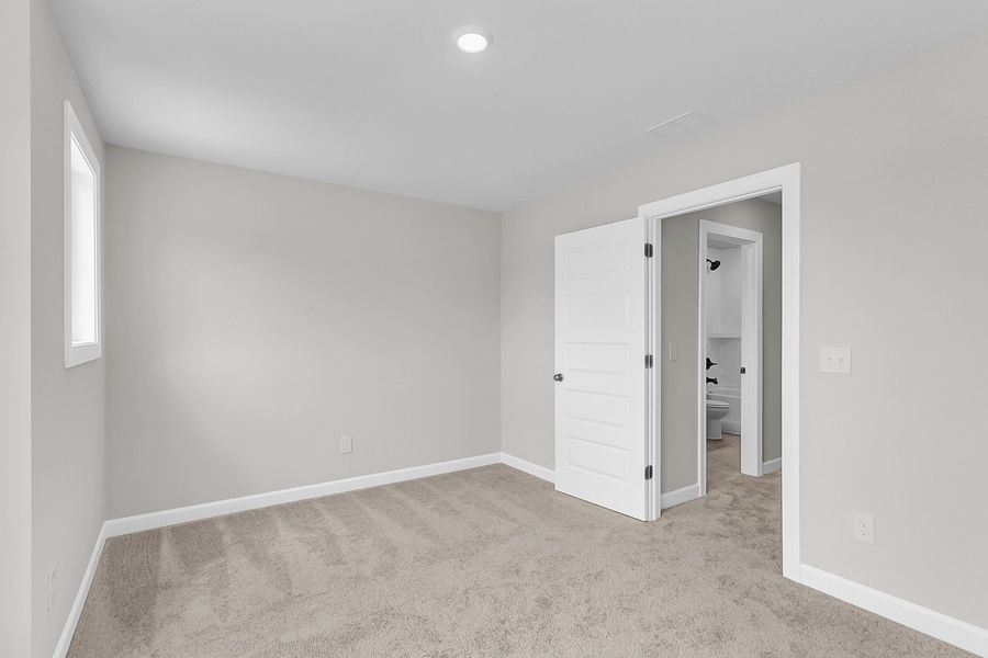 Spacious, unfurnished interior of a new home in Pineland Preserve, Summerville (Image 42).