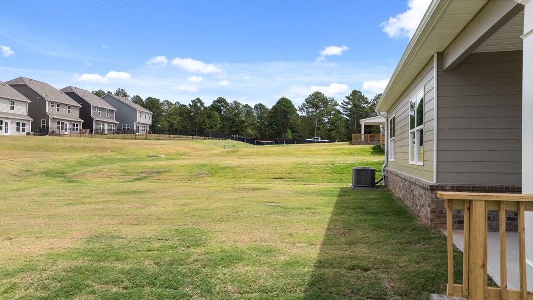 Front exterior of a new home in The Abbey at Trolley Run Station, Aiken, SC, highlighting curb appeal (Image 24).