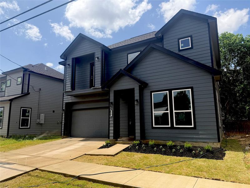 Front exterior of a new home in , Houston, TX, highlighting curb appeal (Image 1). Front exterior of a new home in , Houston, TX, highlighting curb appeal (Image 1).