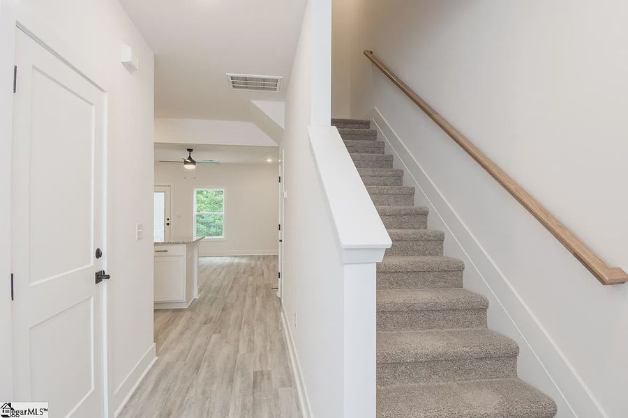Representative unfurnished interior of a home built from the 1568 Townhome by Adams Homes in Parkstone Place Townhomes, Roebuck (Image 13). Representative unfurnished interior of a home built from the 1568 Townhome by Adams Homes in Parkstone Place Townhomes, Roebuck (Image 13).