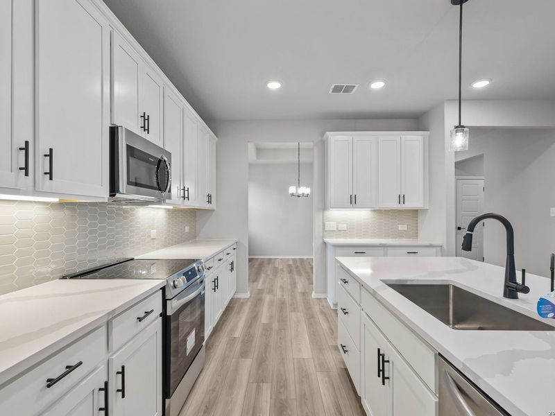 Furnished interior view inside a new home in Royal Crest, San Antonio (Image 8).