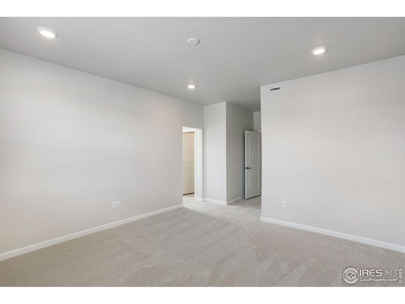 Spacious, unfurnished interior of a new home in Westside Crossing, Berthoud (Image 23).