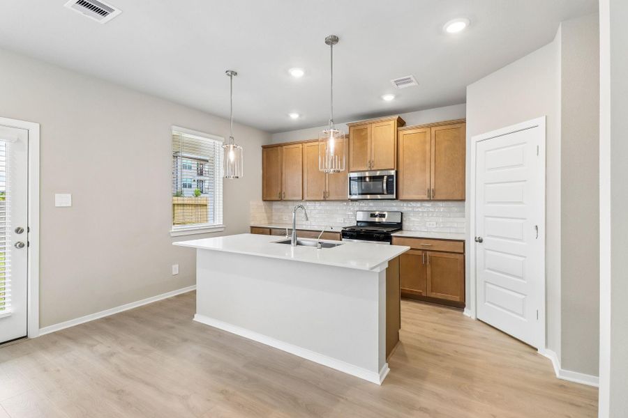 Furnished interior view inside a new home in Parkway Commons - City Series, Missouri City (Image 7).