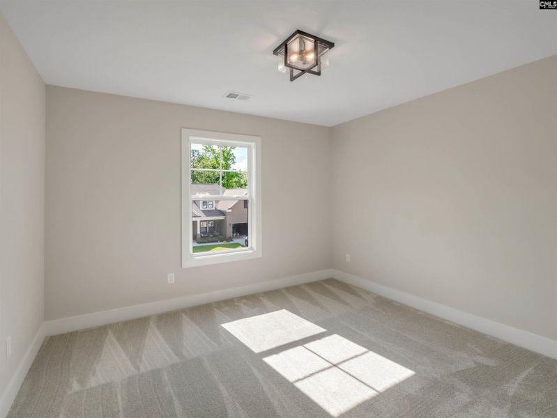Spacious, unfurnished interior of a new home in Collins Cove, Chapin (Image 28).
