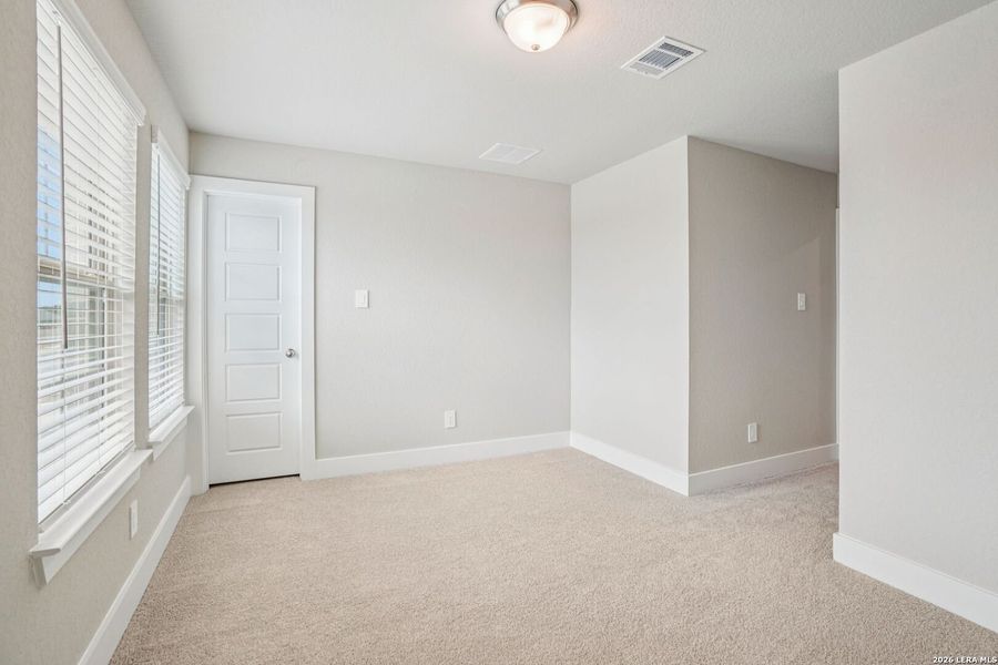 Spacious, unfurnished interior of a new home in Legendary Trails - Premier Series, Cibolo (Image 18).