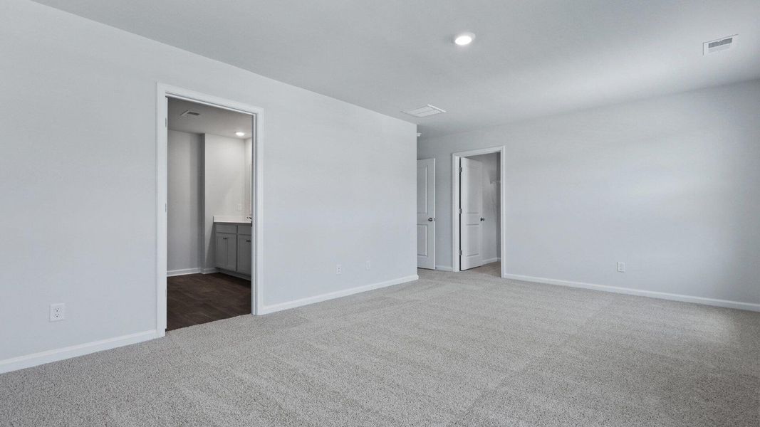 Spacious, unfurnished interior of a new home in Pine Hills at Cane Bay, Summerville (Image 10).