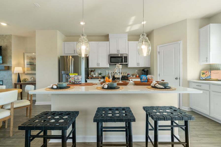 Representative furnished interior of a home built from the Forsyth by Taylor Morrison in Chandler Run, Tucker (Image 12).