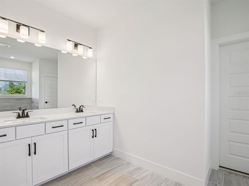Furnished interior view inside a new home in Magnolia Bay - Reserve Series, Nokomis (Image 5). Furnished interior view inside a new home in Magnolia Bay - Reserve Series, Nokomis (Image 5).