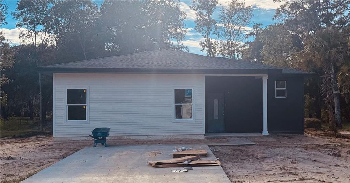 Front exterior of a new home in , Lake Panasoffkee, FL, highlighting curb appeal (Image 2). Front exterior of a new home in , Lake Panasoffkee, FL, highlighting curb appeal (Image 2).