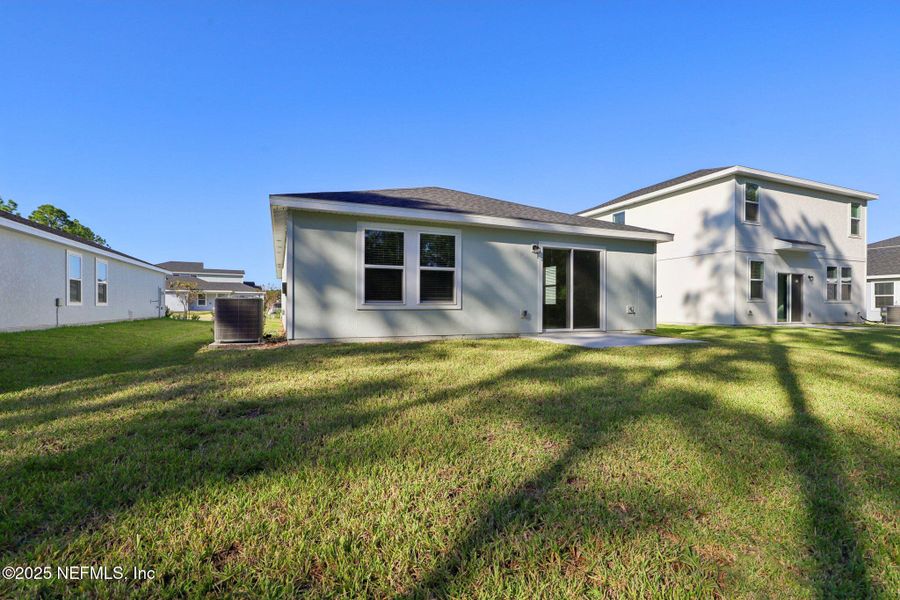 Exterior details and patio area of a home in Flagler Village - Classic Series, Palm Coast (Image 2).