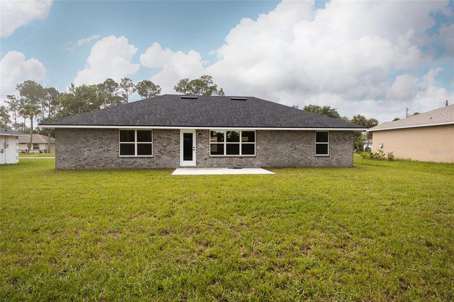 Exterior details and patio area of a home in Palm Coast, Palm Coast (Image 2). Exterior details and patio area of a home in Palm Coast, Palm Coast (Image 2).