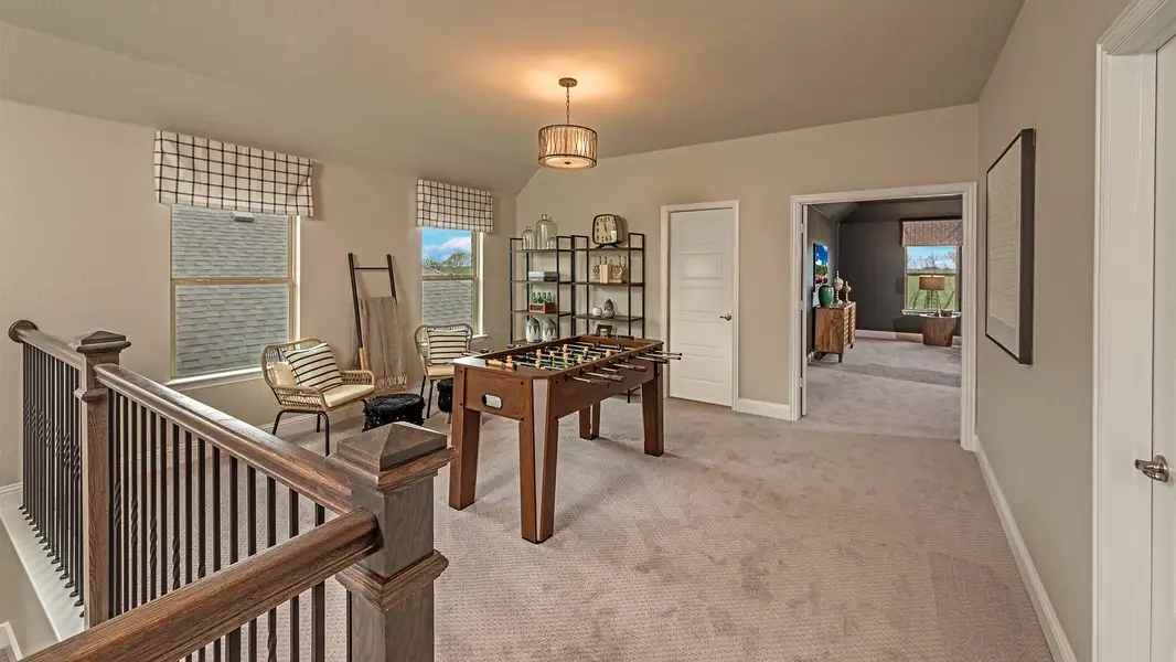 Representative furnished interior of a home built from the Brenham by Beazer Homes in Waterbend, Euless (Image 5).