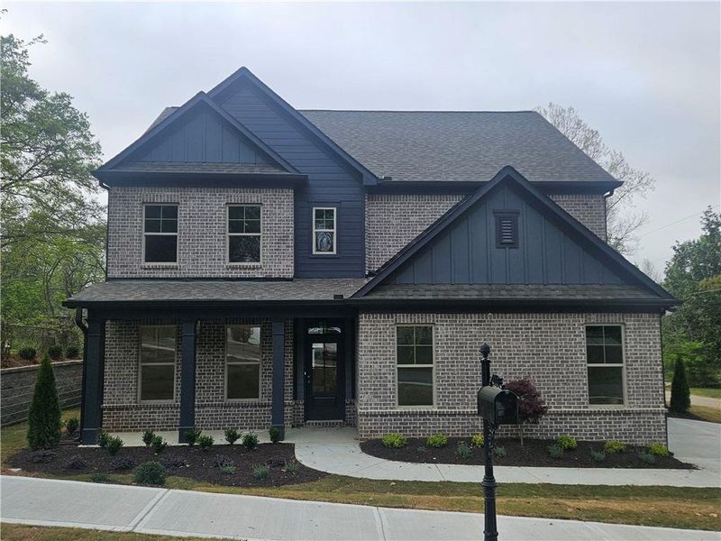 Front exterior of a new home in , Buford, GA, highlighting curb appeal (Image 2).