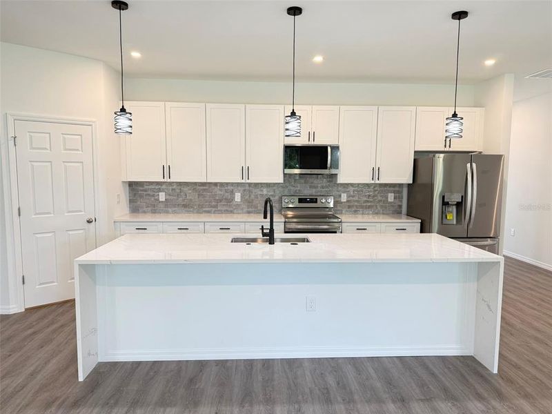 Furnished interior view inside a new home in , North Port (Image 4).