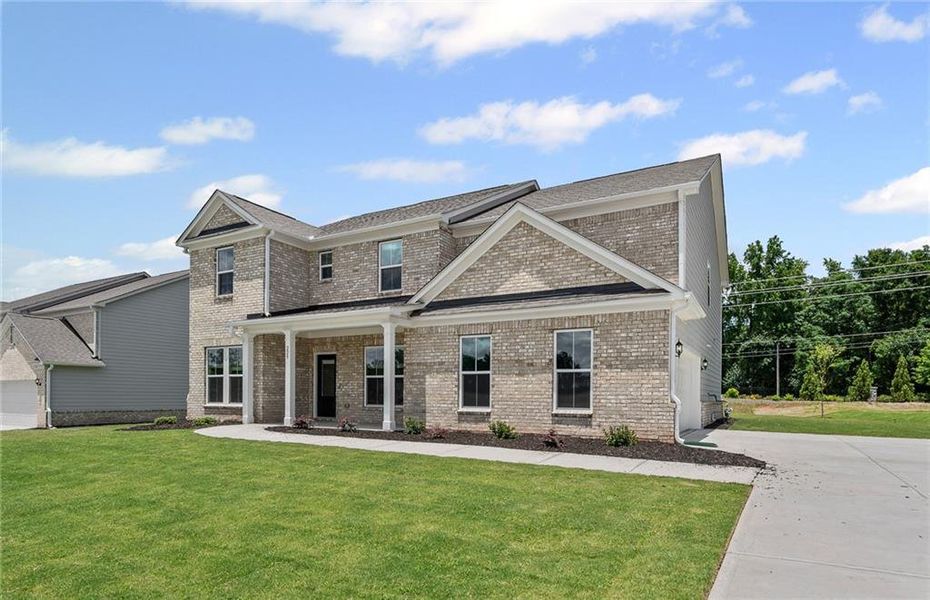 Front exterior of a new home in Anderson Point Estates, McDonough, GA, highlighting curb appeal (Image 20).