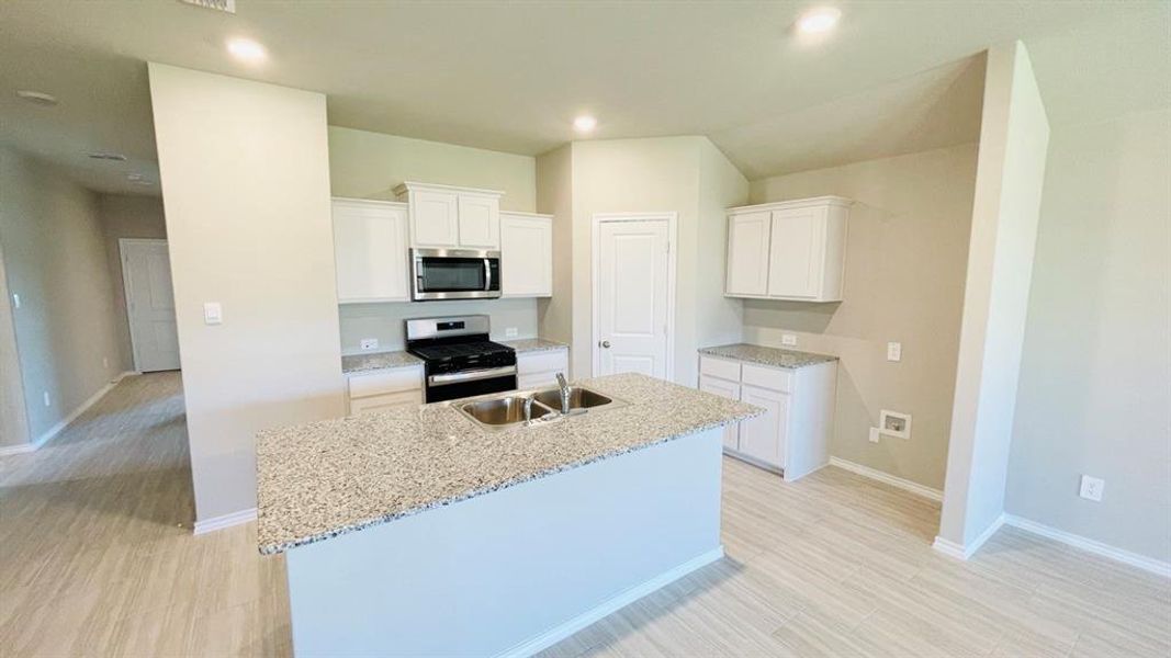 Kitchen - All Home and community information, including pricing, included features, terms, availability and amenities, are subject to change at any time without notice or obligation. All Drawings, pictures, photographs, video, square footages, floor plans, elevations, features, colors and sizes are approximate for illustration purposes only and will vary from the homes as built. Kitchen - All Home and community information, including pricing, included features, terms, availability and amenities, are subject to change at any time without notice or obligation. All Drawings, pictures, photographs, video, square footages, floor plans, elevations, features, colors and sizes are approximate for illustration purposes only and will vary from the homes as built.