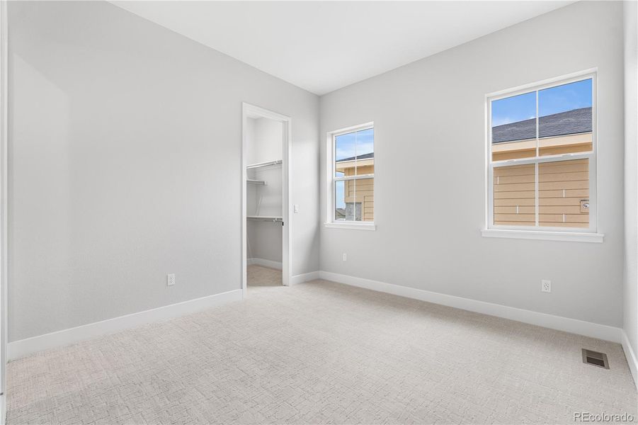 Spacious, unfurnished interior of a new home in Retreat at The Canyons, Castle Pines (Image 36).