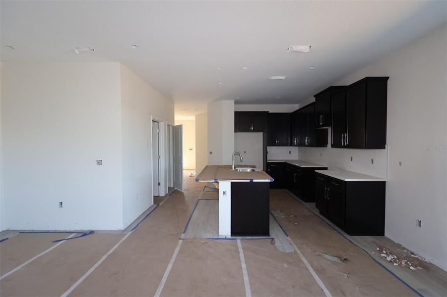 In-progress construction of a new home in Center Lake on the Park, St. Cloud, FL (Image 16).