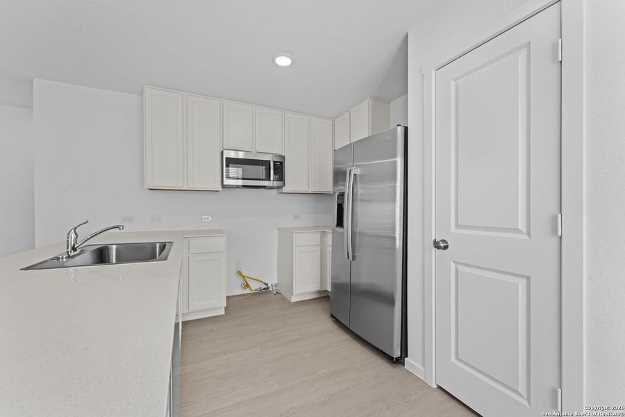 Furnished interior view inside a new home in Torian Village: Belmar Collection, San Antonio (Image 4).