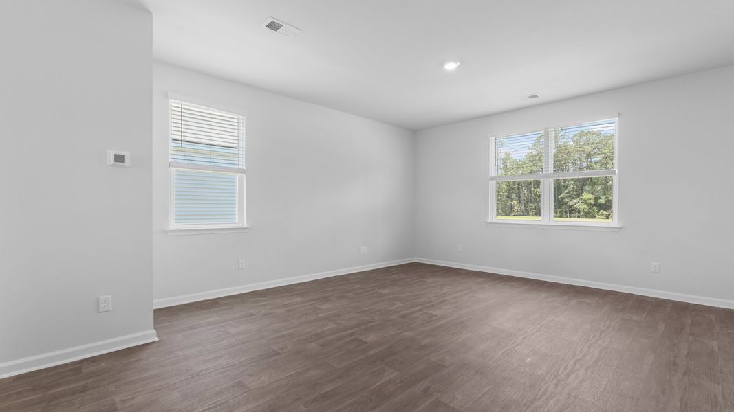 Representative unfurnished interior of a home built from the Aisle by D.R. Horton in Pine Hills at Cane Bay, Summerville (Image 14).