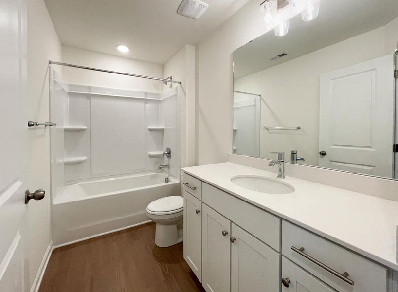 Furnished interior view inside a new home in Bellevue Townhomes, Greenville (Image 9).