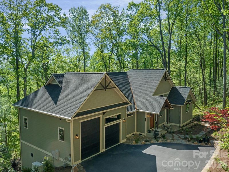 Front exterior of a new home in , Hendersonville, NC, highlighting curb appeal (Image 21).